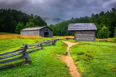 Barns in Cades Cove on a misty day.