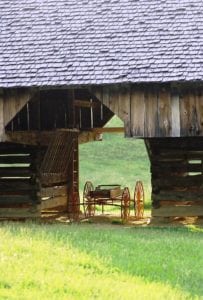 wagon underneath cantilever barn in cades cove