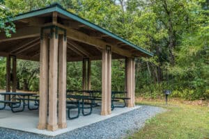 a small pavilion with grill at the cades cove campground